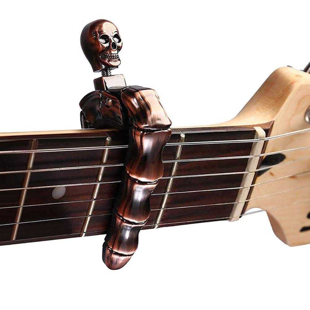 Musical Instrument Note - คาโป้กีตาร์รูปหัวกะโหลกสำหรับกีตาร์โปร่งและกีตาร์ไฟฟ้า คาโป้รูปหัวกะโหลกสำหรับอูคูเลเล่ แบนโจ แมนโดลิน เบส และกีตาร์คลาสสิก